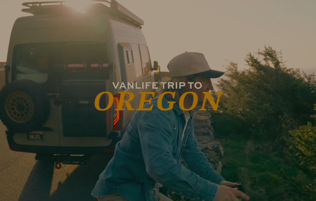 Person sitting next to a van with 'Vanlife Trip to Oregon' text overlay.