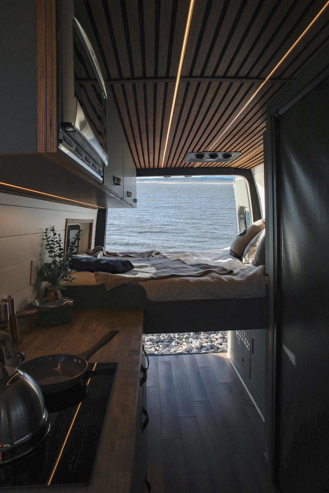 inside of the VanLife Mercedes Benz Sprinter van parked at beach
